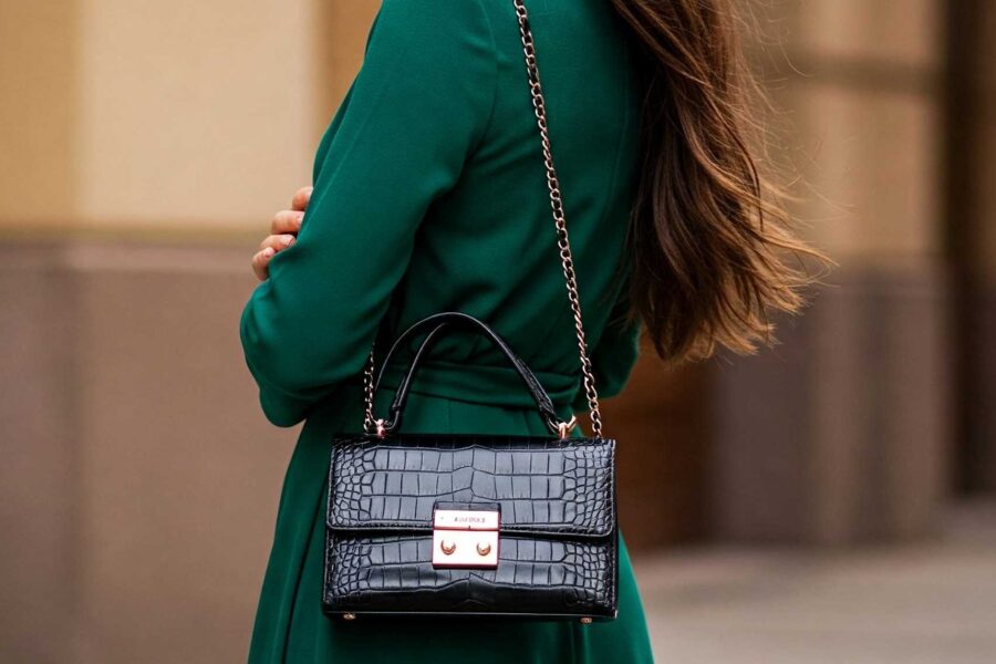 Elegant clutch paired with a black evening dress at a formal event
